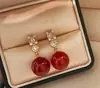 Zhengyuan Shijia Perla Diana Longitud Media Diamante Brillante Aguja Plateada Seiko Aretes Elegantes de Gama Alta Moda Año Nuevo