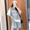 Fake Two-piece Set Feminino Verão Nova moda de manga curta T-shirt Loose Half Shorts Casual Sportswear Two-piece Set