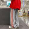 Pantalones deportivos con rayas laterales para parejas de hombres y mujeres, pantalones de verano, pantalones rectos holgados de moda estilo Hong Kong, pantalones casuales de corte bajo.