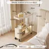 Carro móvil blanco lechoso con ruedas universales, estante de noche estilo crema para dormitorio para guardar bocadillos y cosméticos
