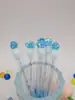 2025 cepillo de máscara de pestañas de tubo de ensayo con forma de concha tridimensional con tubo de ensayo peine de belleza independiente tubo transparente cepillo de máscara de pestañas desechable