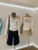 WGWE2026 Otoño Estilo Chica Caliente Americana Estampado de Letras Ajustado Ligeramente Transparente Hombros Descubiertos Manga Larga Camiseta W10842
