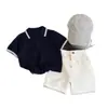 Ropa Infantil Estilo Coreano 2026 Verano Nuevo Elegante Color Block Tejido Camisa Polo Manga Corta Versátil Shorts Casuales Modernos
