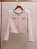 Colección de otoño para mujer de alta gama de Shenzhen Nanyou: Chaqueta corta de tweed estilo francés con adornos de rombos y cuello redondo