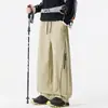 Nuevos pantalones casuales de pierna recta para trabajo de primavera y otoño para hombre, con un diseño moderno estilo americano, corte holgado, talla grande, versátil y un look sofisticado con perneras anchas.