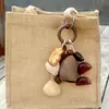 Colgante de Campanilla de Viento de Cáscara de Fruta Hecha a Mano Natural Colgante para Mochila Bolso de Hombro Campana de Cáscara de Fruta Indonesia Campana de Terapia de Sonido Producto Terminado