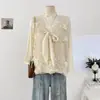 Nuevo chaleco de punto dulce con lazo, estilo suave de capas sin mangas, top tipo suéter para mujer, otoño temprano 2026