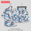 Camisa floral hawaiana traje de playa, estilo fino de verano, adecuada para parejas de hombres y mujeres que viajan a Sanya, talla grande, pantalones cortos casuales holgados