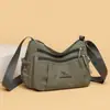 Bolso de mujer nuevo simple versátil bandolera gran capacidad multi-compartimento bolso cruzado moda retro bolso de mamá mujer