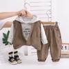 Ropa Infantil Conjunto de Otoño para Niños 2025 Nuevo Conjunto de Tres Piezas con Chaleco y Sudadera con Capucha para Bebé Estiloso de Primavera y Otoño Moderno
