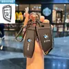 Adecuado para Funda de Llave Bmw Serie 3 Serie 5 Serie 1 Serie 7 X1X2X3X4X5X6 Hoja 530 Coche 320Li Carcasa de Gama Alta