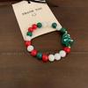 2023 nuevo estilo muñeco de nieve de esmalte artificial Hombre Panqueque Árbol de Navidad dulce lindo todo-partido pulsera de cuentas roja verde