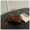 Bolso de mano minimalista único de ante, bolso de hombro coreano Dongdaemun, bolso cruzado de comercio exterior vintage de lujo ligero de alta gama