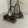 Bolso de hombro casual de nicho de alta gama nuevo 2026, bolso simple para debajo del brazo, bolso de mano retro moderno para mujer