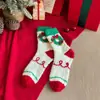 Calcetines gruesos de otoño e invierno para mujer, calcetines de media caña de felpa de coral con dibujos animados para mujer, calcetines cálidos de felpa para dormir en casa, calcetines de Navidad al por mayor