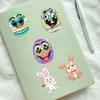 8 nuevos collages de huevos de conejito de Pascua, dibujos animados, rompecabezas interactivo para padres e hijos, rompecabezas de mano, cuenta, pegatinas faciales DIY