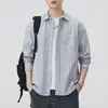 Camisa de hombre de tela Oxford a rayas estilo japonés 2026 nuevo otoño algodón puro cuello camisero manga larga chaqueta venta al por mayor