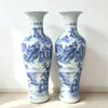 Artesanía de cerámica de Jingdezhen, decoración pintada a mano, paisaje azul y blanco, jarrón de suelo, decoración de moda para sala de estar y hotel.