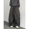 Pantalones cargo de estilo retro japonés, holgados, plisados, de pierna ancha para hombres y mujeres, perfectos para primavera y otoño, con un ambiente relajado y moderno de estilo universitario