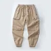 Mono de bolsillos múltiples estilo americano para primavera y otoño, marca de moda retro perezosa para hombre Ruan Shuai, pantalones casuales holgados con cordón en el tobillo