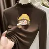 Camiseta de manga larga de terciopelo alemán con cuello alto y ribete de oreja de madera para niñas 2026 Otoño/Invierno prenda interior capa base top cálido cepillado