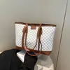 Lujo Ligero Casual Simple 2025 Nuevo Retro Moda Femenina Retro Verano Gran Capacidad Bolso de Hombro Tote para Viajes
