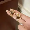 Nuevos Pendientes Dorados de Fuegos Artificiales Ojo de Tigre Otoñales Elegantes para Mujer Diseño Único de Nicho Lujo Accesible Pendientes de Gama Alta