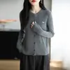 Cardigan de Tricô de Lã Fina Novo Outono Antecipado 2025 Gola Redonda Manga Longa Feminino Cor Pura Listrado Solto Versátil Top