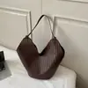 Bolsa bucket casual nicho estilo coreano Shuai Mijia para mulheres, nova coleção primavera 2026, elegante e moderna, para usar no ombro, ideal para o dia a dia