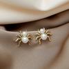 Aretes Aguja de Plata Nuevo de Alta Gama Atmosférico Perla Araña Personalidad Retro Creativo Temperamento Diseño Estéreo Joyería para la Oreja