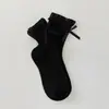 Calcetines para niños para otoño e invierno con bordes rizados y lazos, adecuados para niñas y bebés, estilo Lolita, calcetines de media pantorrilla sin presión