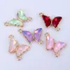Super Flash Más Vendido Colgante de Mariposa con Diamantes de Cristal Accesorios DIY Aleación Electrochapada Colgante Doble Oblicuo Collar Pendientes