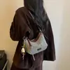 Bolsa pequena tecida requintada transfronteiriça para mulheres, nova moda outono 2026 bolsa transversal versátil, bolsa popular de ombro único estilo bolinho