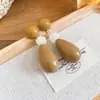 Pendientes de Botón Ovalados de Resina Transfronterizos Europeos y Americanos Pendientes Maillard de Otoño e Invierno Pendientes Simples de Moda Versátiles para Mujer Sensación de Alta Gama