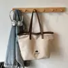 Versátil Bolso de Lona Bordado Simple de Gran Capacidad Moda Nuevo Invierno de Gama Alta Bolso de Hombro Tendencia
