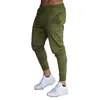 Comércio exterior calça esportiva fina masculina para primavera e outono calça de corrida para fitness cor sólida moda casual calça lápis calça de jogging