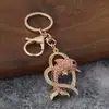 Novo chaveiro de golfinho com incrustação de diamantes estilo coreano, acessório de bolsa fofo e personalizado, pingente criativo de animal marinho, pequeno presente