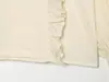 Al por mayor Verano 2026 Nuevo Estilo Europeo y Americano Camisa de Mujer de Color Sólido con Mangas Largas y Volantes 61739