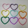 Nuevo Llavero de Pulsera Redonda de Silicona en Forma de Corazón Correa de Muñeca Anticaída y Antiperdida para Teléfono Móvil Anillo de Silicona Portátil para Teléfono Móvil