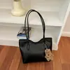 Nuevo bolso de axila de alta calidad para principios de otoño de 2026, bolso de hombro simple de gran capacidad, bolso tote para el trabajo, bolsos de mujer al por mayor
