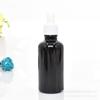 Fornecimento spot frasco de óleo essencial preto Frasco pequeno preto de amostra 10ml frasco de essência frasco de vidro preto com conta-gotas