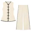 Venta al por mayor transfronteriza 2026 Moda europea y americana conjunto de top de botones anudado con ribete de color contrastante + pantalones largos para mujer K71950/49