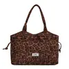 Bolso de hombro tote de gran capacidad versátil de moda nuevo 2026 transfronterizo para mujer, estampado de leopardo, tendencia niche
