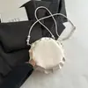 Bolso de mano retro minimalista para mujer, nuevo modelo de otoño 2026, bolso de hombro elegante y con estilo para llevar debajo del brazo, bolso pequeño redondo de moda para el día a día