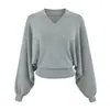 Top de punto blanco con cuello en V y mangas murciélago para mujer, nuevo diseño otoño/invierno, elegante, adelgazante, versátil y perfecto como capa interior