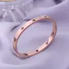 Pulsera de Acero de Titanio Hueca de Estrella de Cinco Puntas Caliente Transfronteriza Todo Partido Viento Rojo de Internet para Damas Pulsera Abierta de Acero Inoxidable 18K