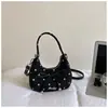 Exquisito bolso de lunares de nicho para mujer, nuevo bolso cruzado versátil de moda 2026, bolso de mano elegante de alta gama