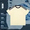Camiseta Básica de Verano de Algodón Puro con Cuello Redondo y Manga Corta con Tres Rayas, Holgada, Versátil, Ropa para Pareja, Camiseta de Manga Corta, Exportación Transfronteriza