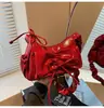 Nova bolsa transversal coreana de nicho personalizada plissada pequena, bolsa de ombro e transversal para o dia a dia estilo balé, moderna e versátil