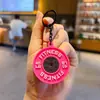 Llavero Colgante Creativo Mini Mancuerna Placa Llavero Pareja Coche Bolsa Llavero Deportivo Pequeño Adorno Al por Mayor